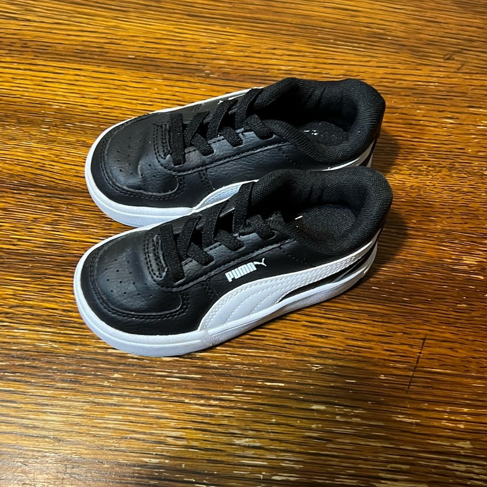 Black and White Kid Pumas